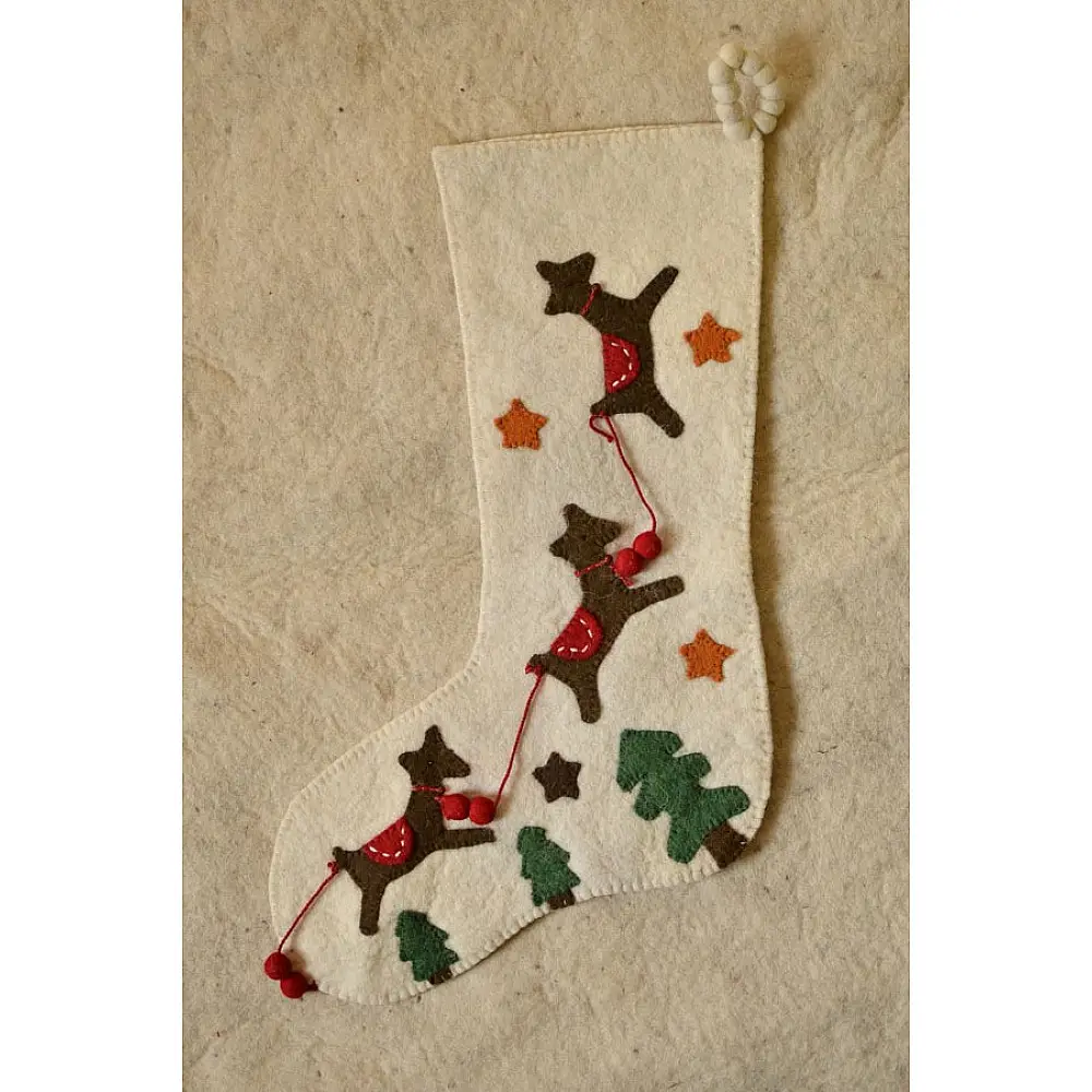 cream felt Christmas stocking candy sock featuring handcrafted green holly leaves and red berry accents