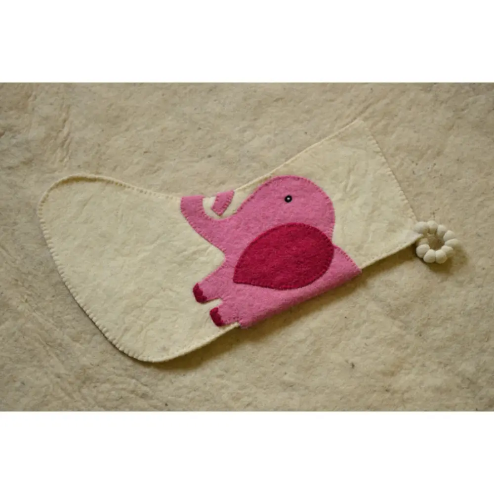 cream felt Christmas stocking candy sock featuring a handcrafted pink and magenta elephant patch