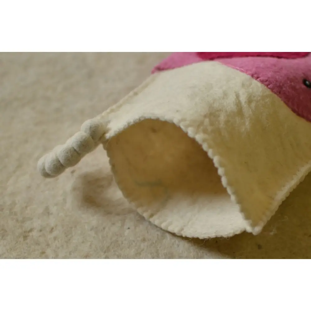 cream felt Christmas stocking candy sock featuring a handcrafted pink and magenta elephant patch