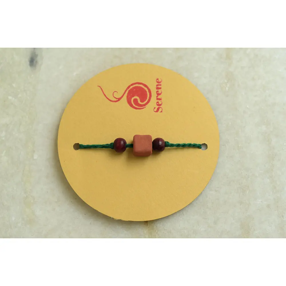 Terracotta ❂ Handmade . Rakhi { a }