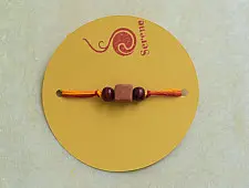 Terracotta ❂ Handmade . Rakhi { b }