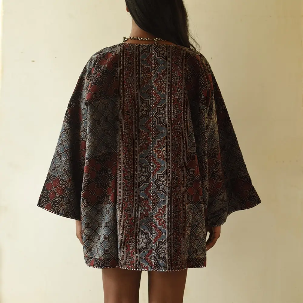 reversible ajrakh hand block printed kimono jacket black base madder red interlocking floral jaal block print solid black reverse sustainable luxury outerwear artisanal jacket