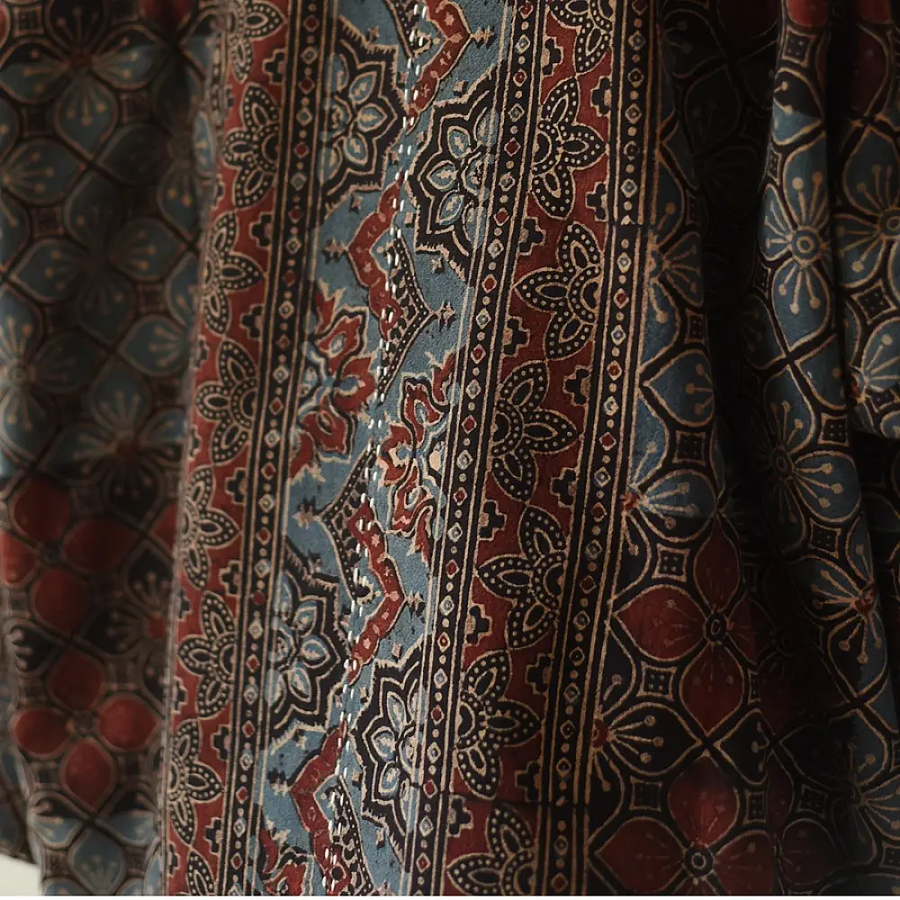 reversible ajrakh hand block printed kimono jacket black base madder red interlocking floral jaal block print solid black reverse sustainable luxury outerwear artisanal jacket