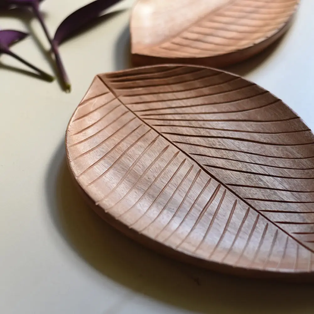 handmade wooden leaf shaped platters set of two with carved vein texture