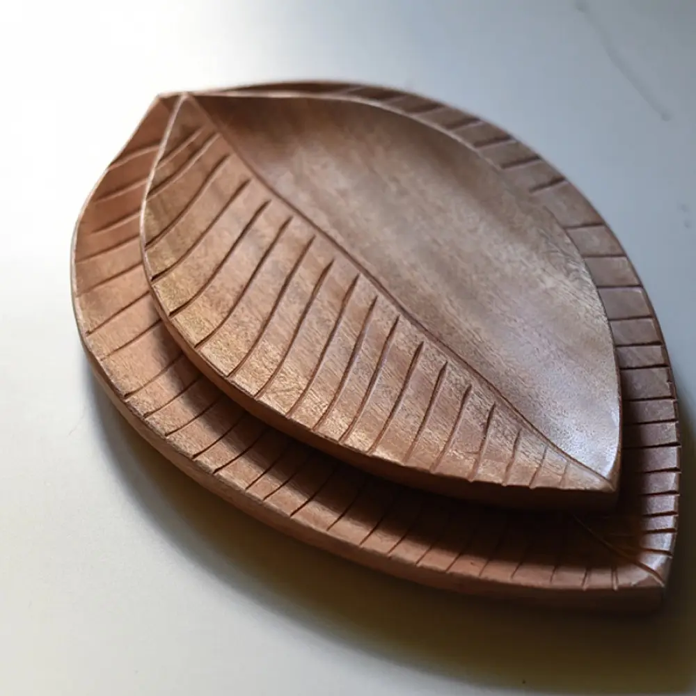 handmade wooden leaf shaped platters set of two with carved vein texture