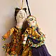 handcrafted traditional kutchi cloth dolls in deep blue and gold ethnic outfits with mirror work embroidery