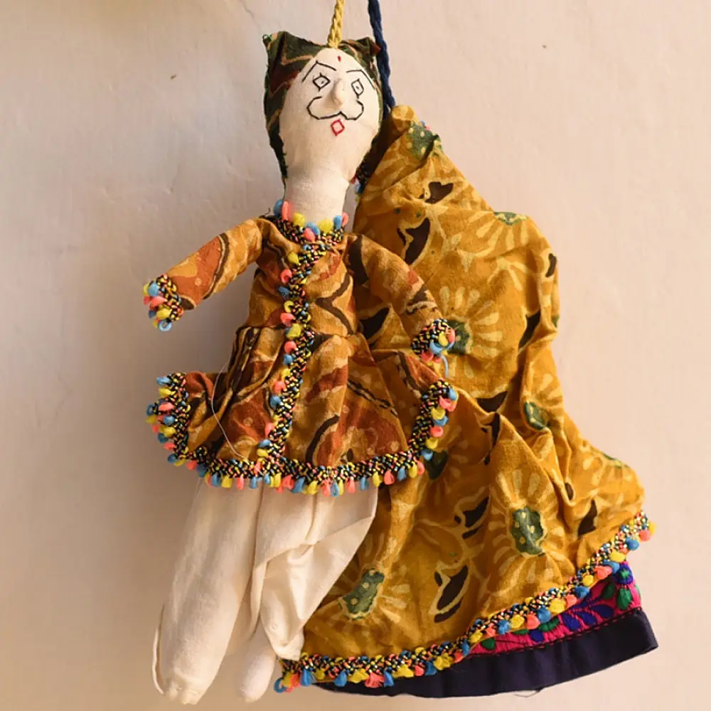 handcrafted traditional kutchi cloth dolls in deep blue and gold ethnic outfits with mirror work embroidery