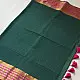 handloom pure cotton saree in deep forest green with contrasting magenta pink striped zari border and handcrafted tassels on pallu