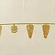 handmade brass leaf design toran door hanging featuring mango leaf shaped brass plates linked on a brass chain with central floral pendant