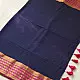 handloom pure cotton saree in deep ink blue with contrasting magenta pink striped zari border and handcrafted tassels on pallu 