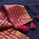 handloom pure cotton saree in deep ink blue with contrasting magenta pink striped zari border and handcrafted tassels on pallu 