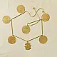 handmade brass toran door hanging featuring scalloped circular brass discs linked on a brass chain with a central floral pendant drop   