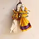 handcrafted traditional kutchi couple cloth dolls in yellow and white ethnic outfits with mirror work embroidery