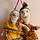 handcrafted traditional kutchi couple cloth dolls in yellow and white ethnic outfits with mirror work embroidery