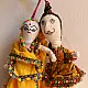 handcrafted traditional kutchi couple cloth dolls in yellow and white ethnic outfits with mirror work embroidery