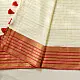 handloom pure cotton saree in soft ivory white featuring a contrasting rust orange striped zari border and handcrafted tassels on pallu