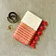 handloom pure cotton saree in soft ivory white featuring a contrasting rust orange striped zari border and handcrafted tassels on pallu