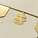 handmade brass toran door hanging featuring geometric brass flags linked on a brass chain with a central floral motif pendant