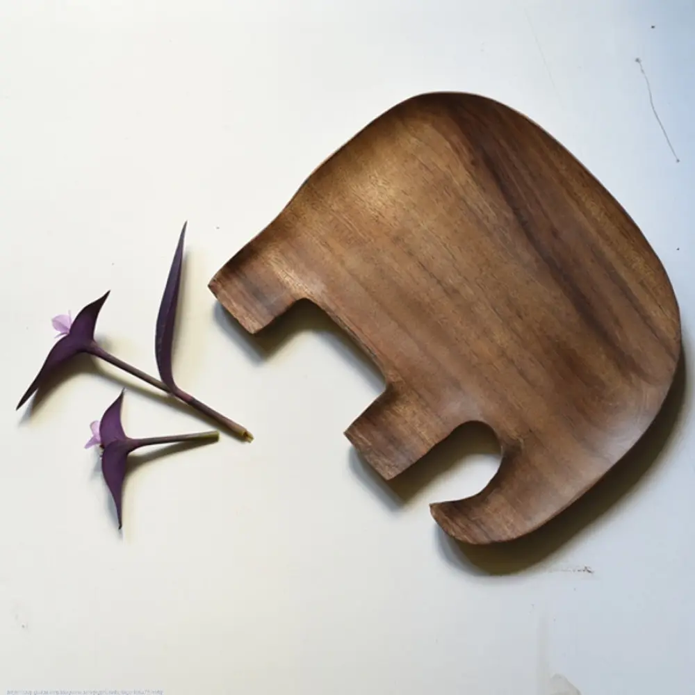 handmade wooden elephant shaped platter with natural wood finish