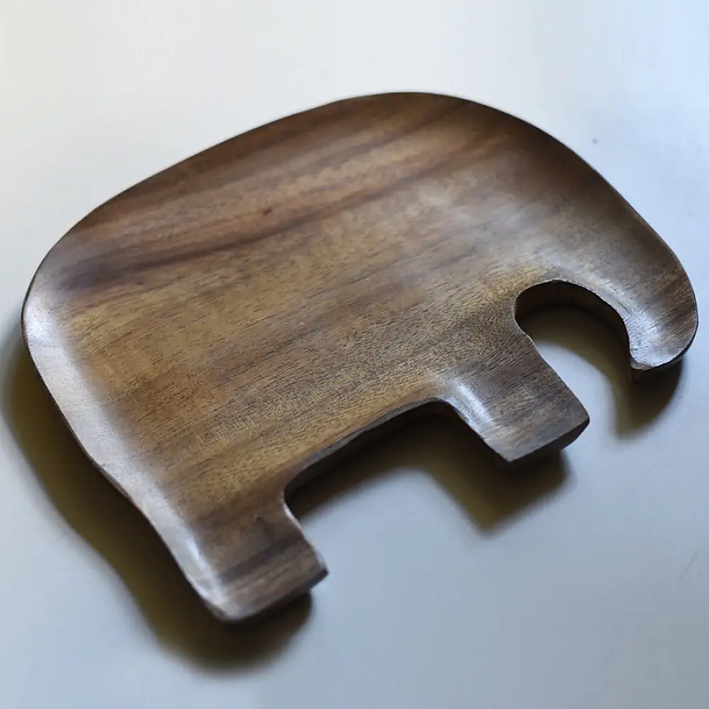 handmade wooden elephant shaped platter with natural wood finish