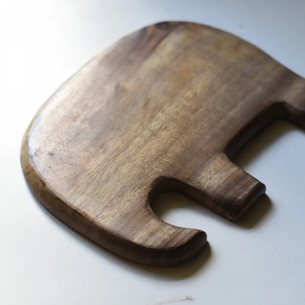handmade wooden elephant shaped platter with natural wood finish