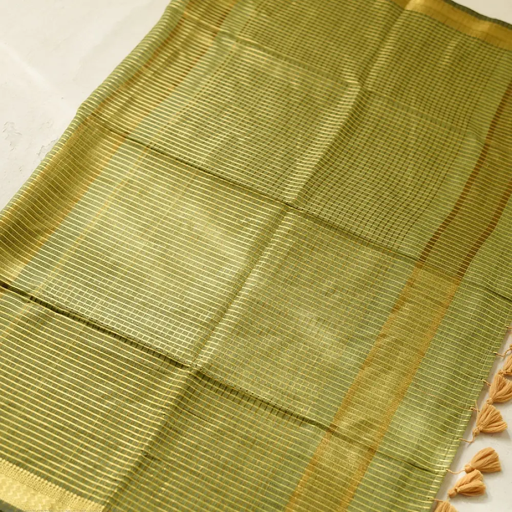 handloom pure cotton saree in subtle olive heena green with woven golden zari striped border and matching handcrafted tassels on pallu