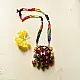 handcrafted banjara round embroidered fabric pendant necklace with mirror work pom poms cowrie shells and multi strand beaded chain