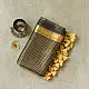 handloom pure cotton saree in classic black featuring fine golden zari checked pattern throughout the body with a rich gold zari border and handcrafted tassels