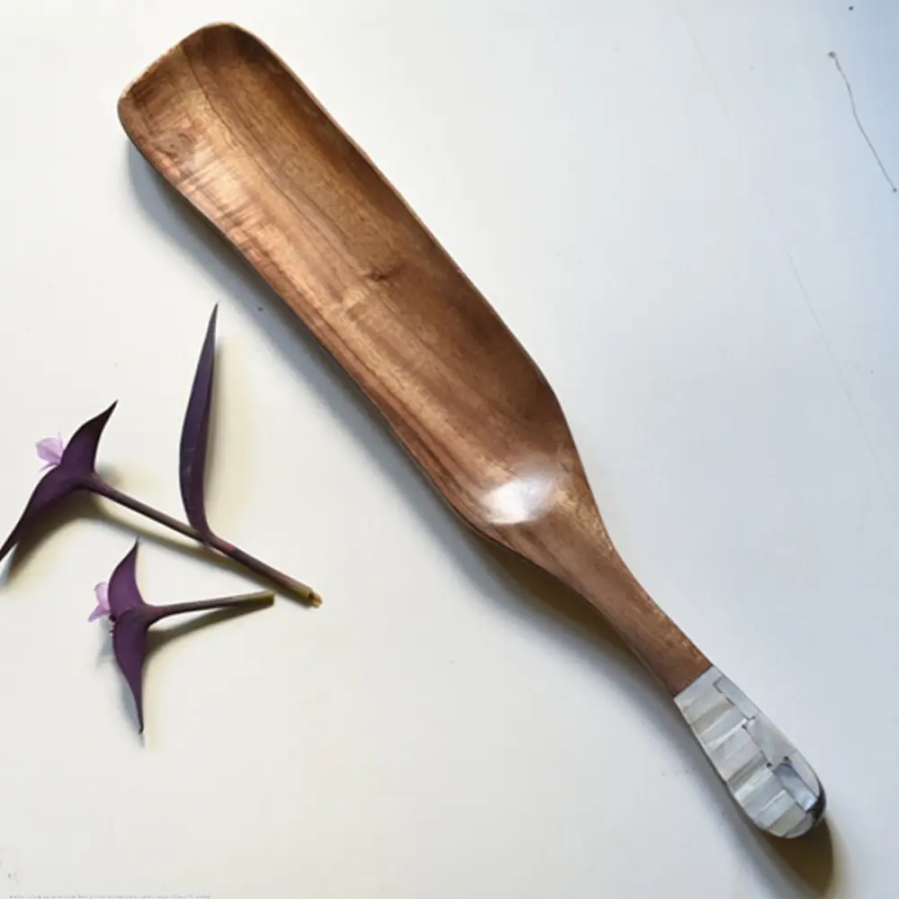 handmade wooden momo platter with long paddle shaped design