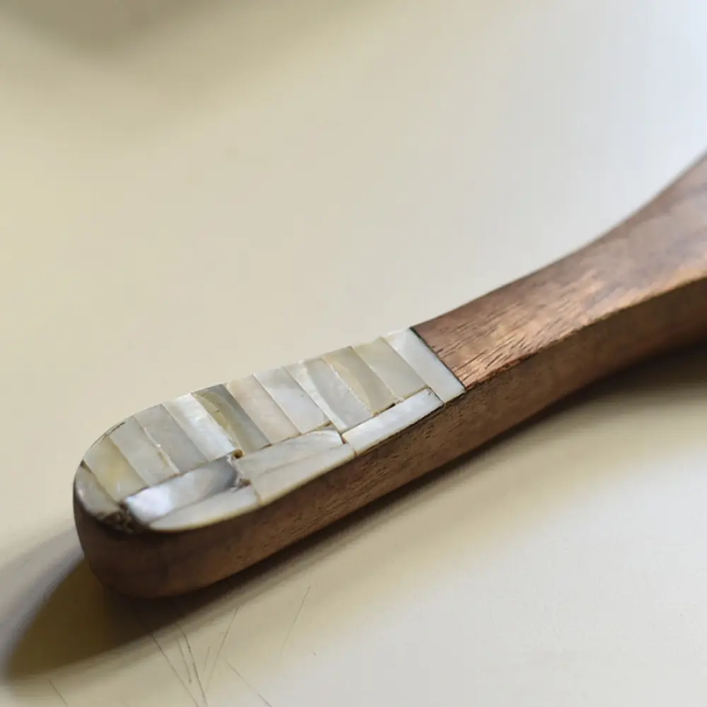 handmade wooden momo platter with long paddle shaped design