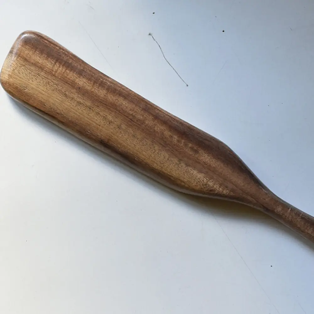 handmade wooden momo platter with long paddle shaped design