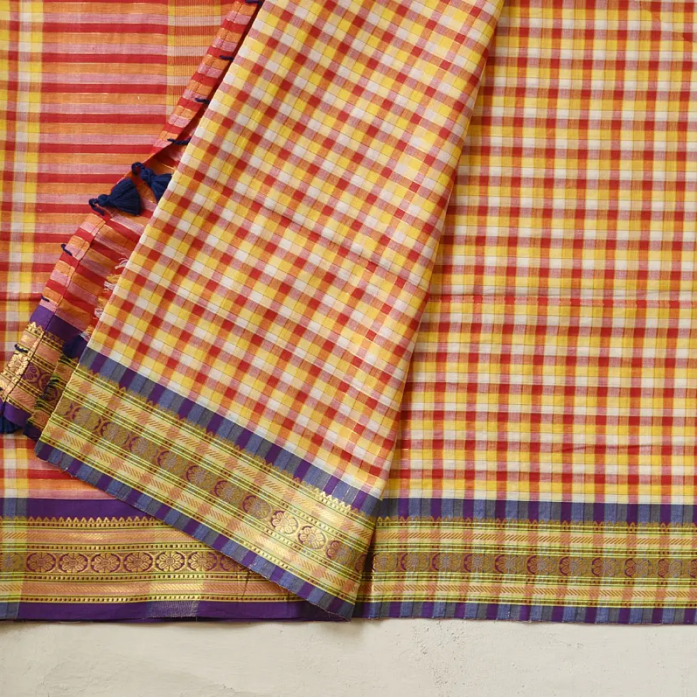handloom pure cotton saree with vibrant pink orange yellow multicolor stripes contrast purple zari border and handcrafted navy tassels