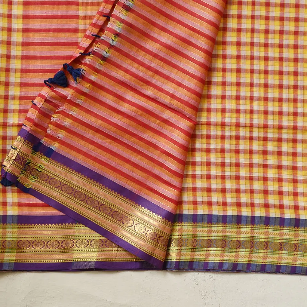 handloom pure cotton saree with vibrant pink orange yellow multicolor stripes contrast purple zari border and handcrafted navy tassels