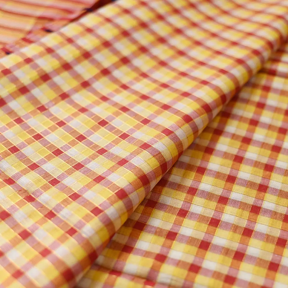 handloom pure cotton saree with vibrant pink orange yellow multicolor stripes contrast purple zari border and handcrafted navy tassels