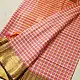 handloom pure cotton saree with peach and orange sunset striped pattern woven gold zari border and handcrafted pink and orange tassels