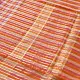 handloom pure cotton saree with peach and orange sunset striped pattern woven gold zari border and handcrafted pink and orange tassels