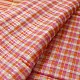 handloom pure cotton saree with peach and orange sunset striped pattern woven gold zari border and handcrafted pink and orange tassels