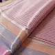 handloom pure cotton saree in soft baby pink featuring subtle fine stripes contrast woven zari border and handcrafted turquoise blue tassels on pallu