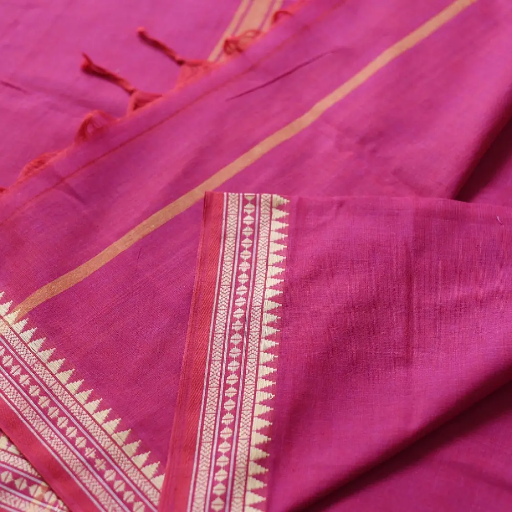 handloom begampuri pure cotton saree in deep rani pink with mustard yellow pinstripes and woven temple borders with fringe tassels