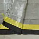 handloom pure cotton saree in soft grey and white featuring a bright lemon yellow color blocked panel with a black striped zari border and handcrafted tassels