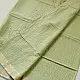 handloom pure cotton saree in subtle pista green featuring delicate fine stripes woven golden zari border and soft beige handcrafted tassels