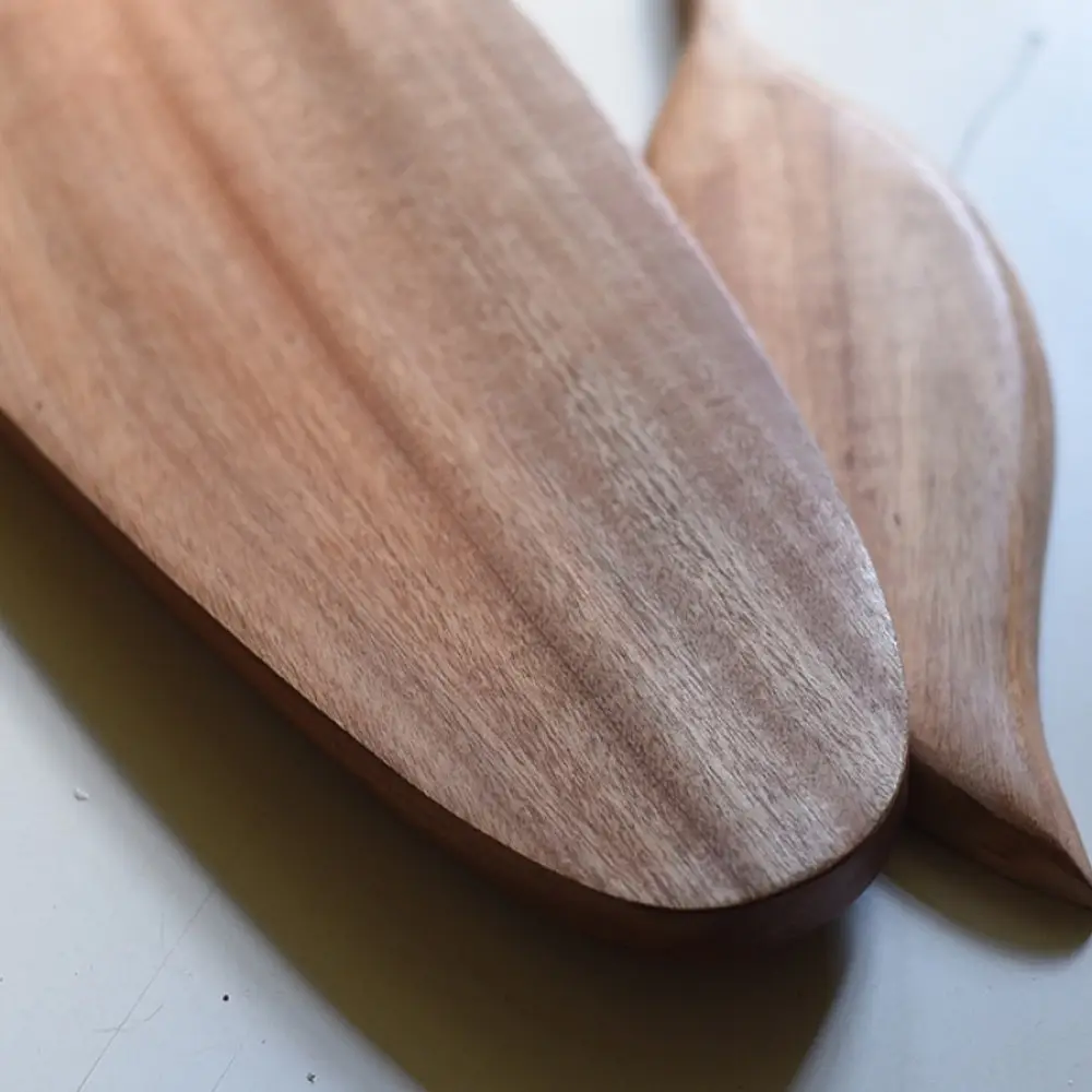 handmade wooden platter set with leaf shaped and oval carved designs
