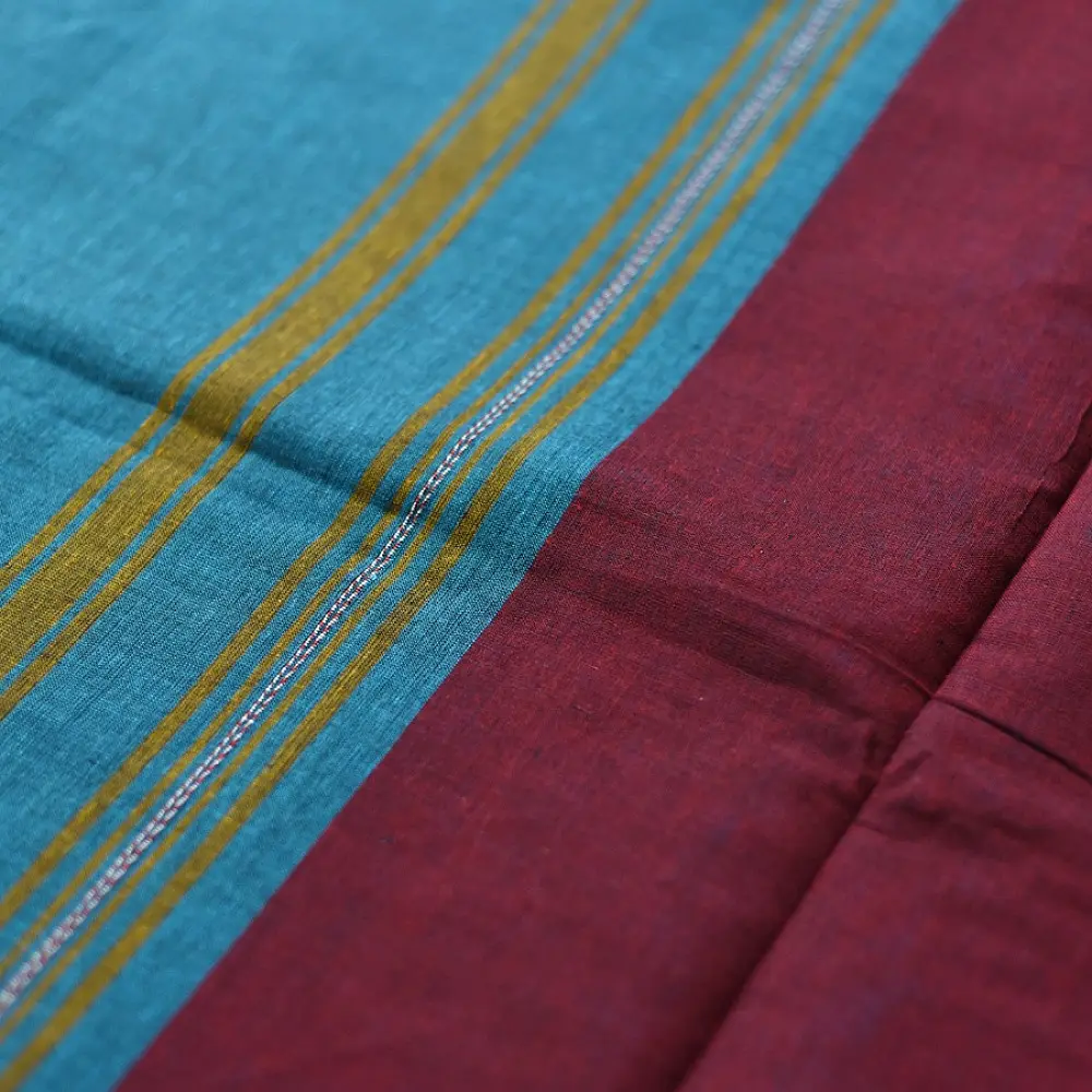 handloom begampuri pure cotton saree in teal blue with red and mustard yellow woven temple borders and tassel fringe