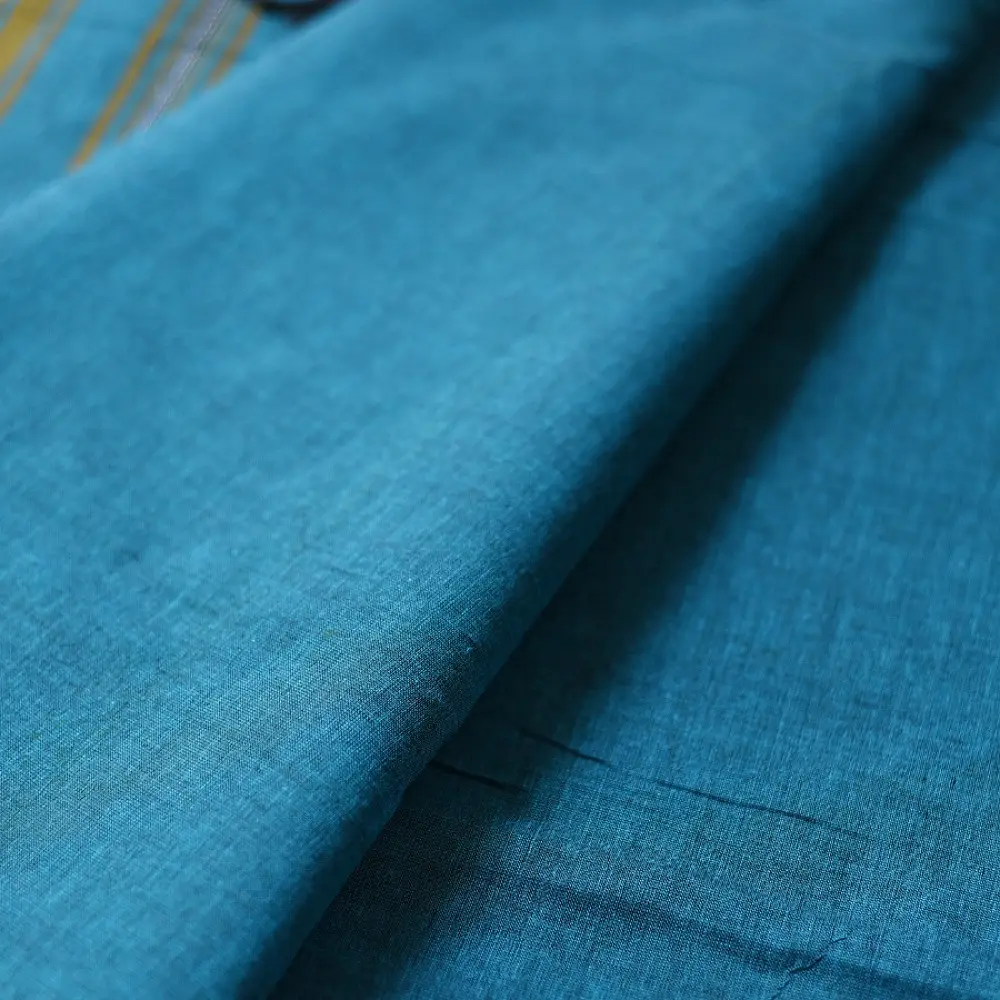 handloom begampuri pure cotton saree in teal blue with red and mustard yellow woven temple borders and tassel fringe