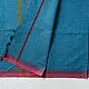 handloom begampuri pure cotton saree in teal blue with red and mustard yellow woven temple borders and tassel fringe