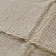 handloom pure cotton saree in luminous moti white featuring delicate micro stripes a woven gold zari border and soft handcrafted tassels