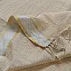 handloom pure cotton saree in luminous moti white featuring delicate micro stripes a woven gold zari border and soft handcrafted tassels