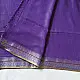 handloom pure cotton saree in deep royal purple featuring a intricate gold woven zari border and handcrafted matching purple tassels