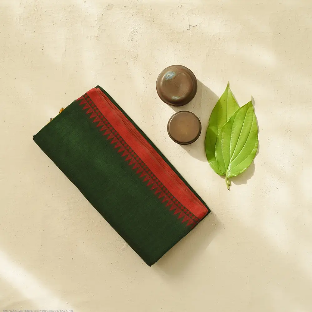 handloom begampuri pure cotton saree in forest green with red and mustard yellow woven temple borders and tassel fringe