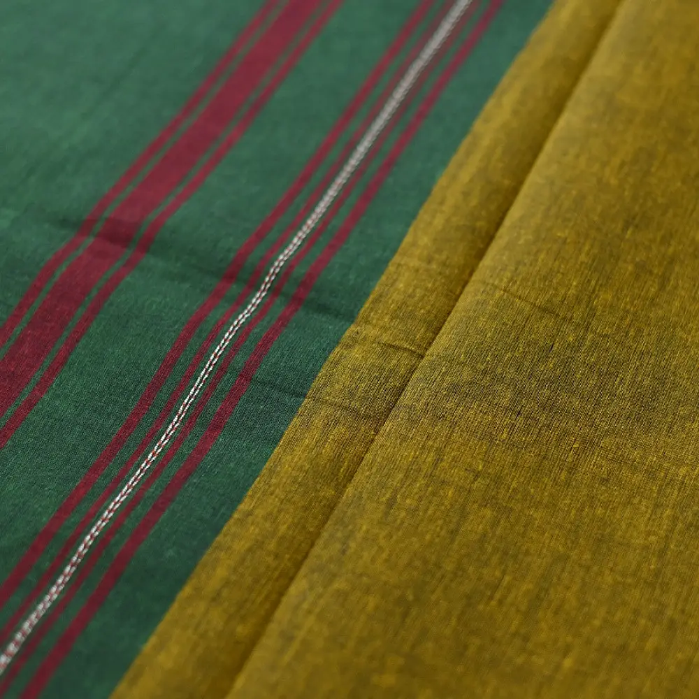 handloom begampuri pure cotton saree in forest green with red and mustard yellow woven temple borders and tassel fringe
